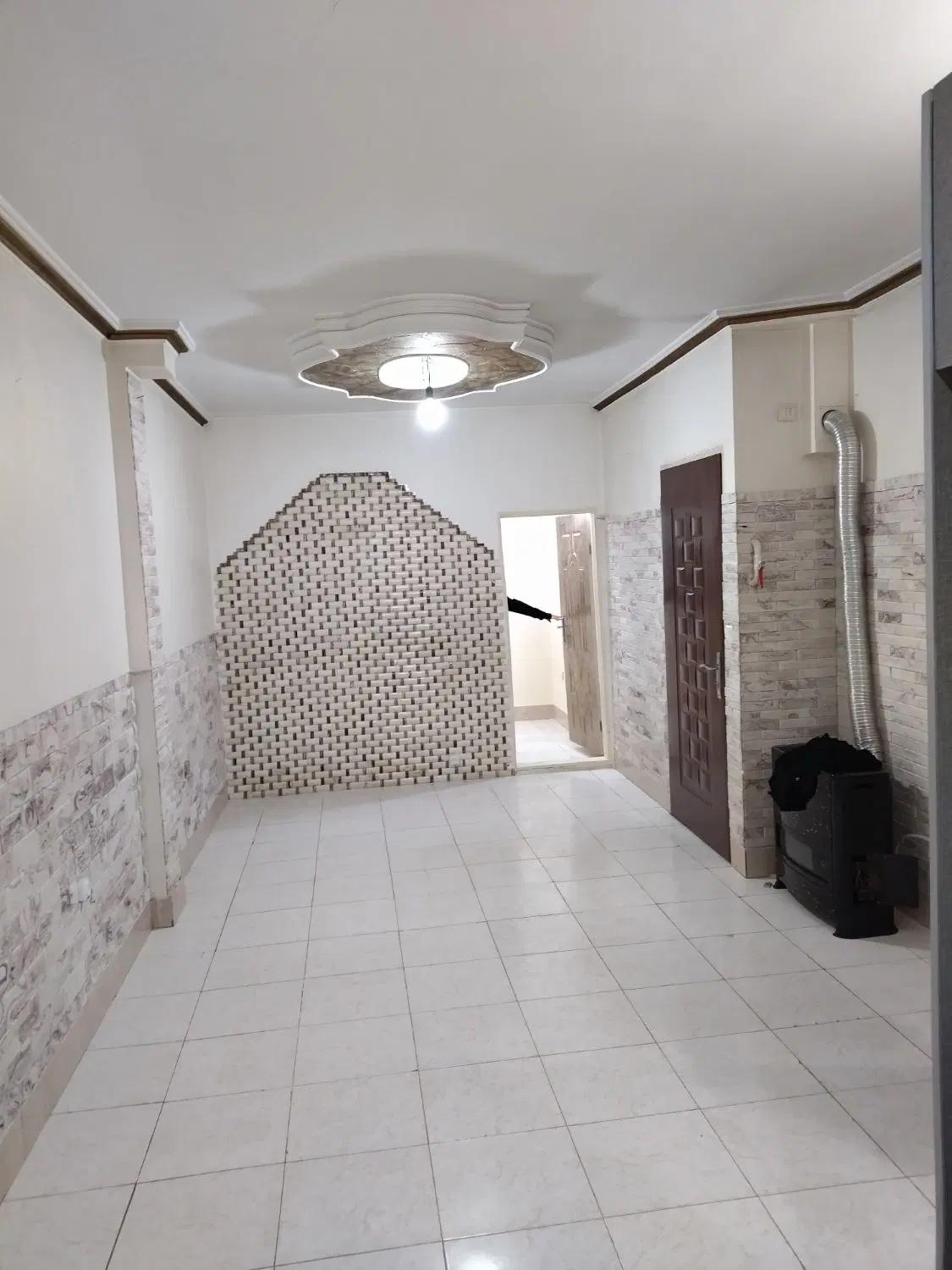 آپارتمان 54م2خواب ط همکف تک واحدپارکینک و انبار