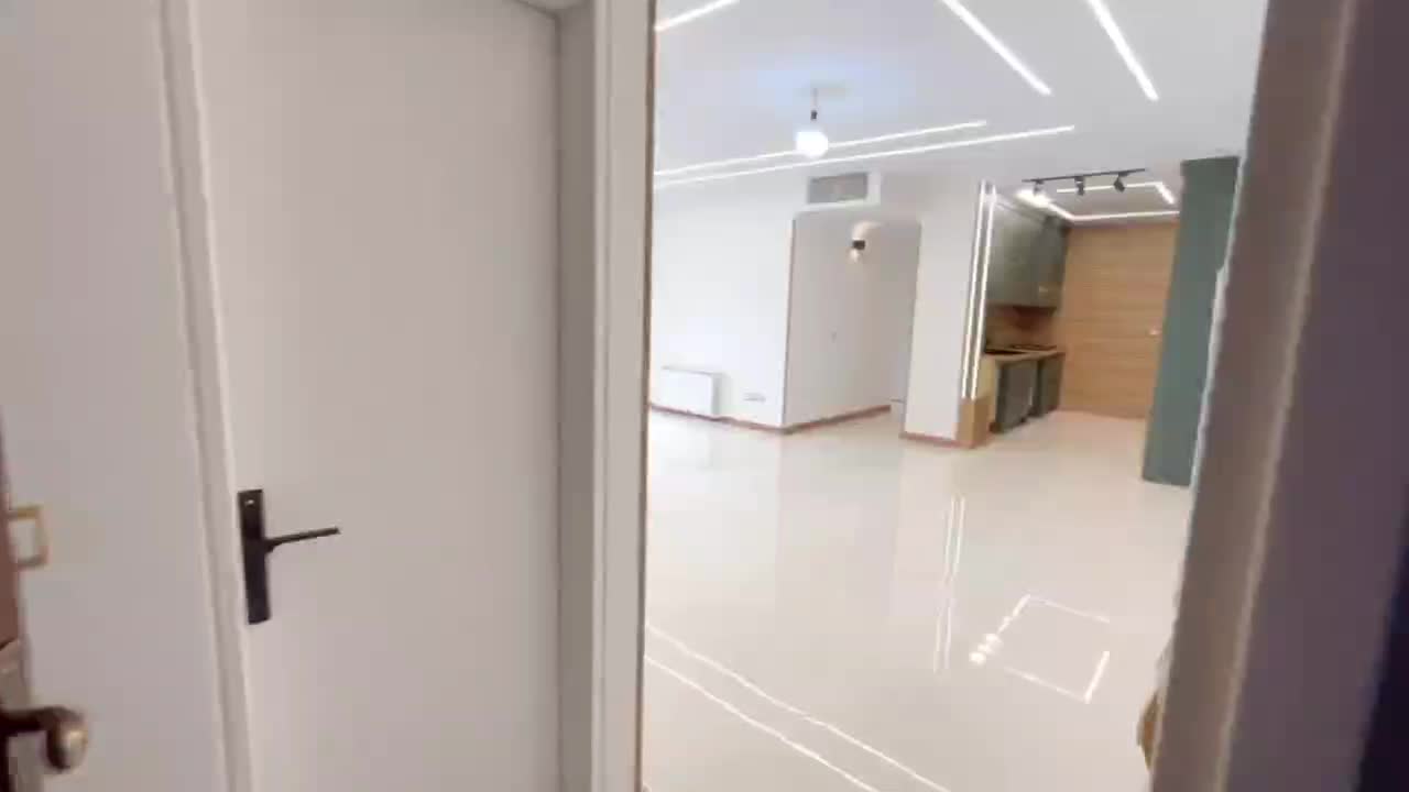 87متر_سالن پنجره قدی پرده خور_نما تراورتن_جنت آباد