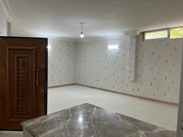 آپارتمان ۷۵ متری طبقه همکف سنایی ۱۱